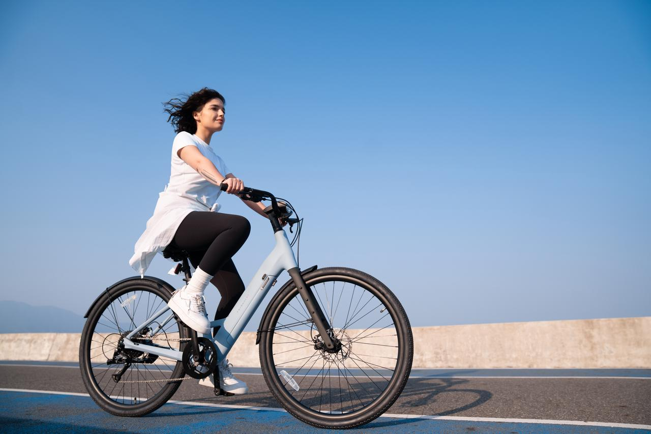 a woman ride  ebike