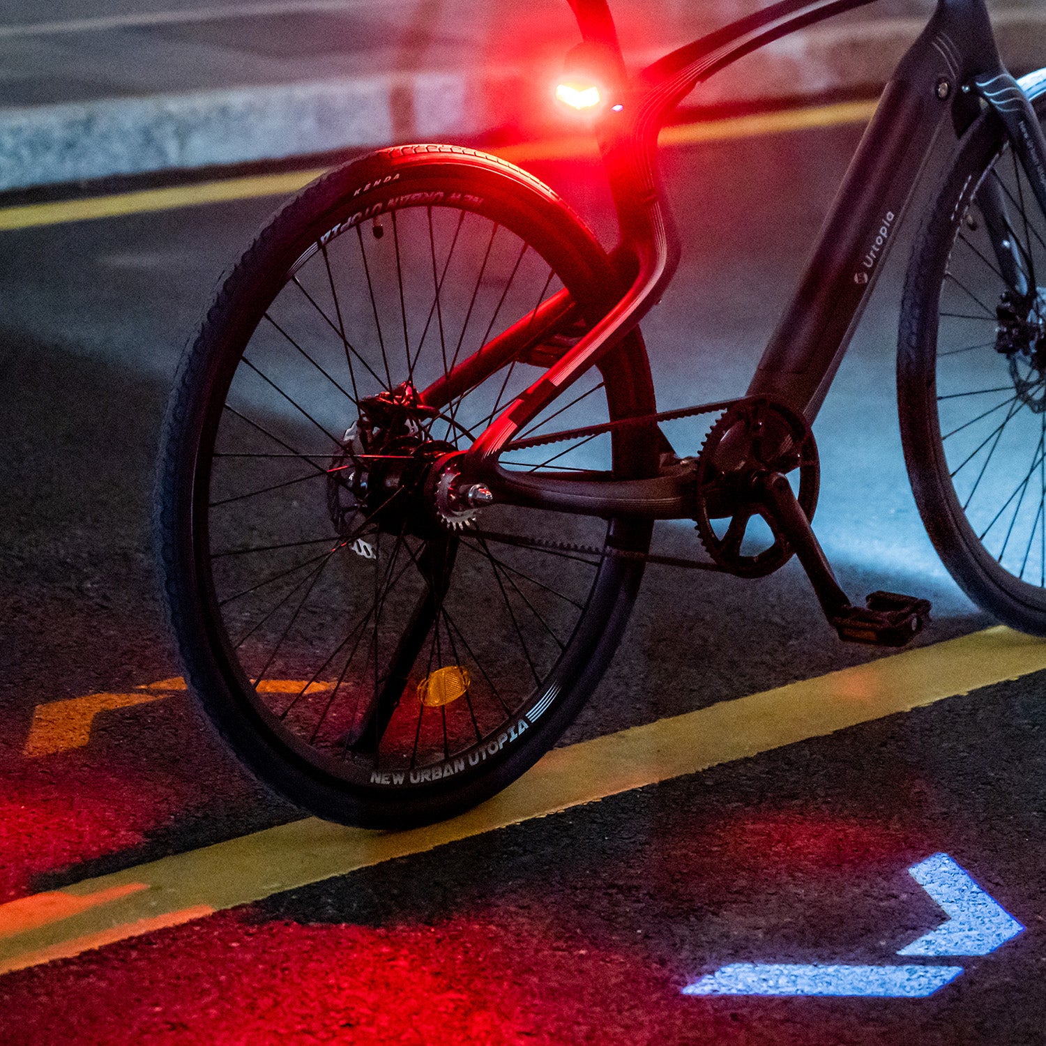 E-bike in action with ARES lights. Premium taillight with turn indicators.